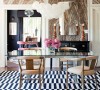 Gabriel-Hendifar-dining-room-agate-walls-black-white-striped-rug-bulb-pendant1