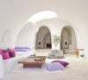 Greece Cyclades Oia interiors architecture Perivola Suites living room white minimalist purples
