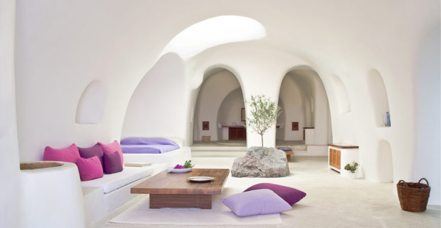 Greece Cyclades Oia interiors architecture Perivola Suites living room white minimalist purples
