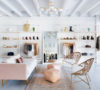 Adelante Boutique by Claire Zinnecker pink couch white gold peach natural peacock bucket chairs