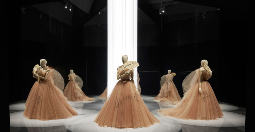 Dior exhibit at the V&A London photo by Adrien Dirand tulle organza gowns fans