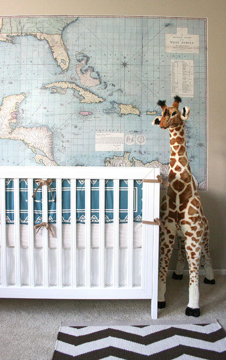 Jackson's nursery: crib, map, giraffe